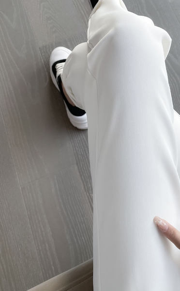 Naiste elegantsed tasku ja lukuga püksid