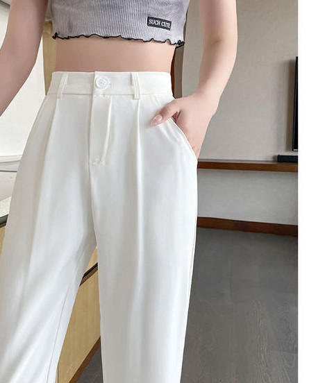 Naiste elegantsed tasku ja lukuga püksid