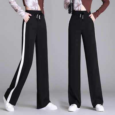 Hosszú, elegáns női nadrág szegéllyel és zsebbel