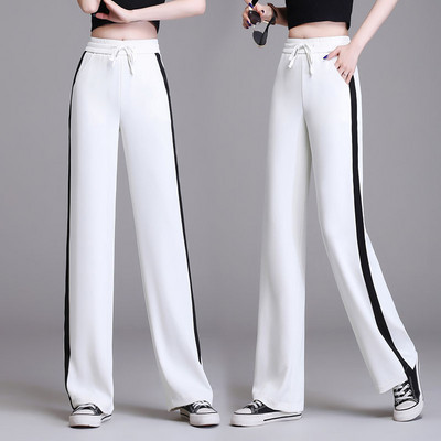 Hosszú, elegáns női nadrág szegéllyel és zsebbel