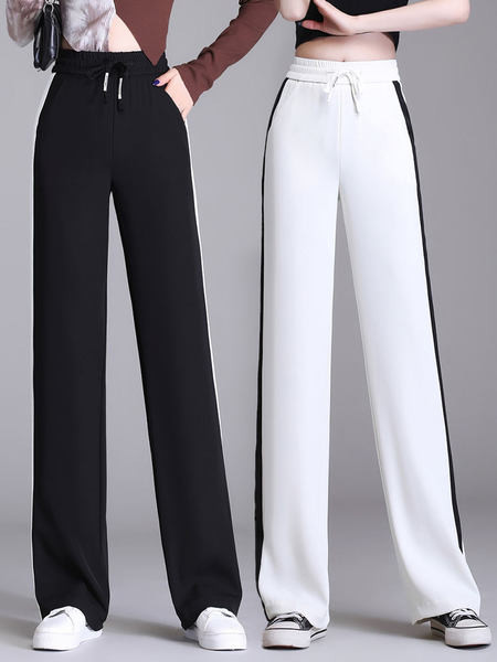 Hosszú, elegáns női nadrág szegéllyel és zsebbel