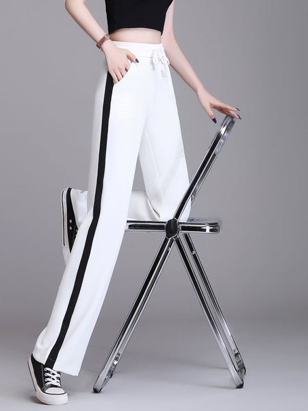 Hosszú, elegáns női nadrág szegéllyel és zsebbel