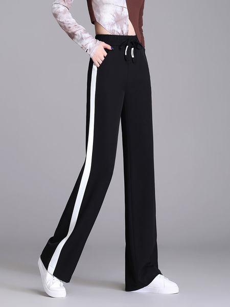 Hosszú, elegáns női nadrág szegéllyel és zsebbel