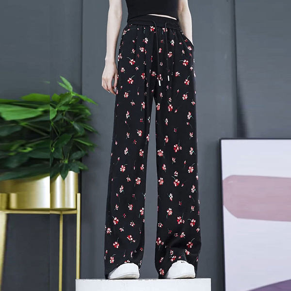 Lezser széles szárú női nadrág dekoratív virágokkal