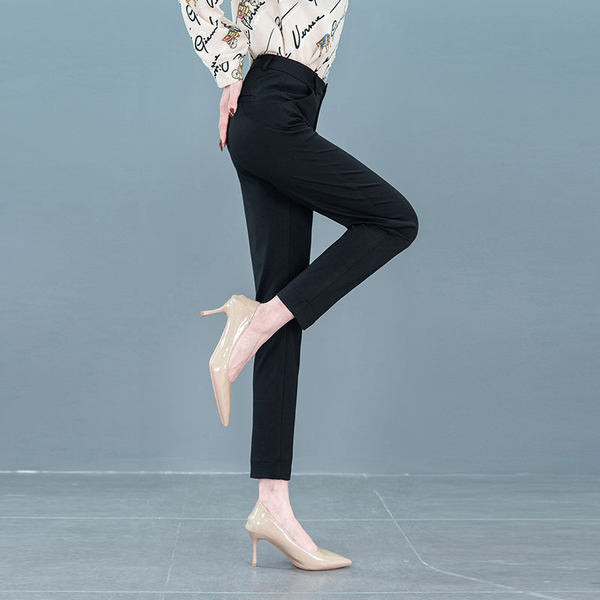 Naiste elegantsed kolmes värvitoonis lõhiku ja taskuga kõrge pihaosaga püksid