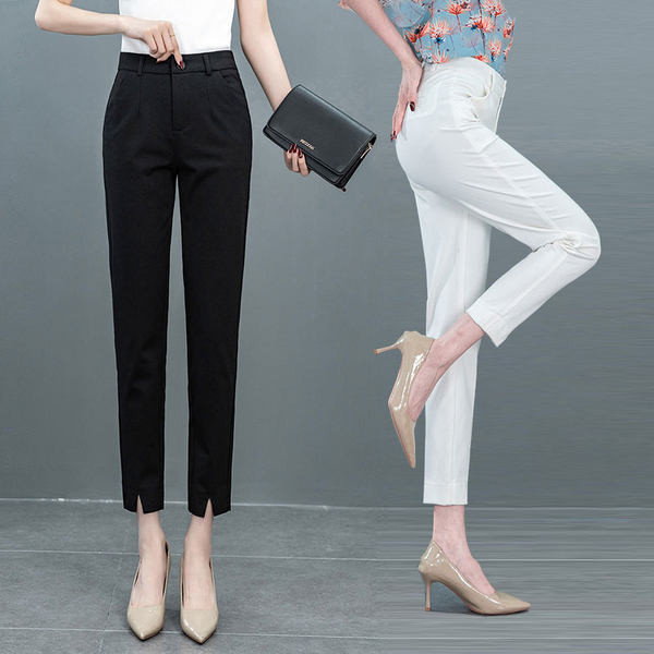 Naiste elegantsed kolmes värvitoonis lõhiku ja taskuga kõrge pihaosaga püksid