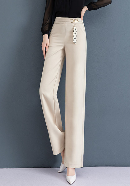 Elegáns női nadrág dekoratív övvel, két színben