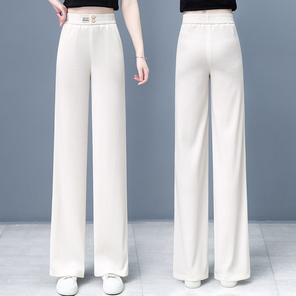 Laiad kummiku ja taskuga naistepüksid