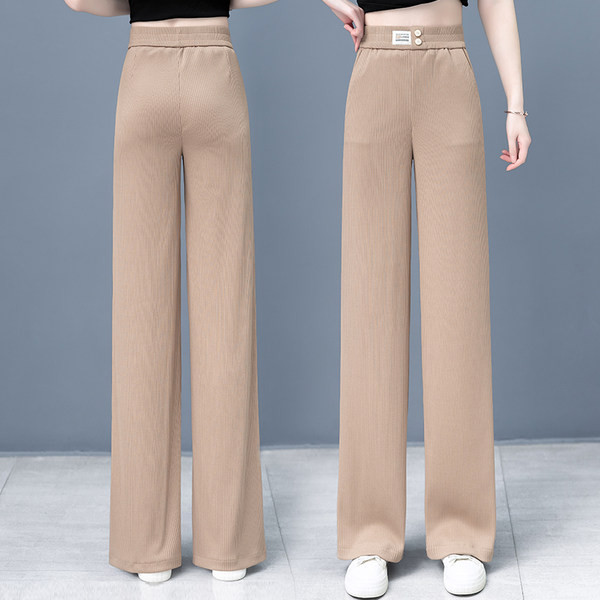 Laiad kummiku ja taskuga naistepüksid