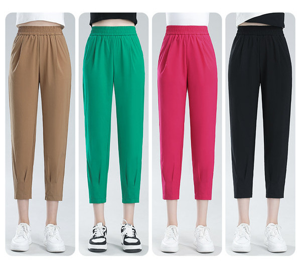 Naiste vabaaja püksid dekoratiivse taskuga