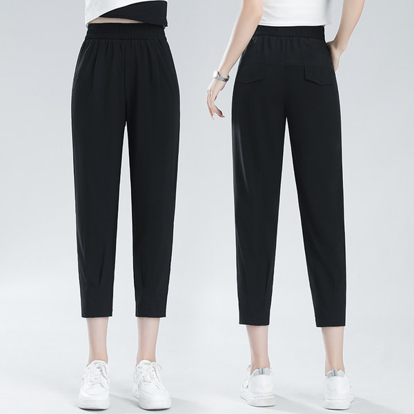 Naiste vabaaja püksid dekoratiivse taskuga