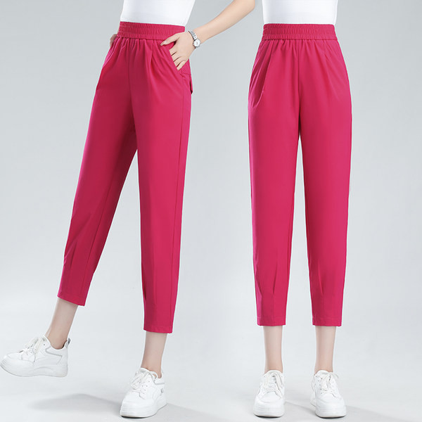 Naiste vabaaja püksid dekoratiivse taskuga