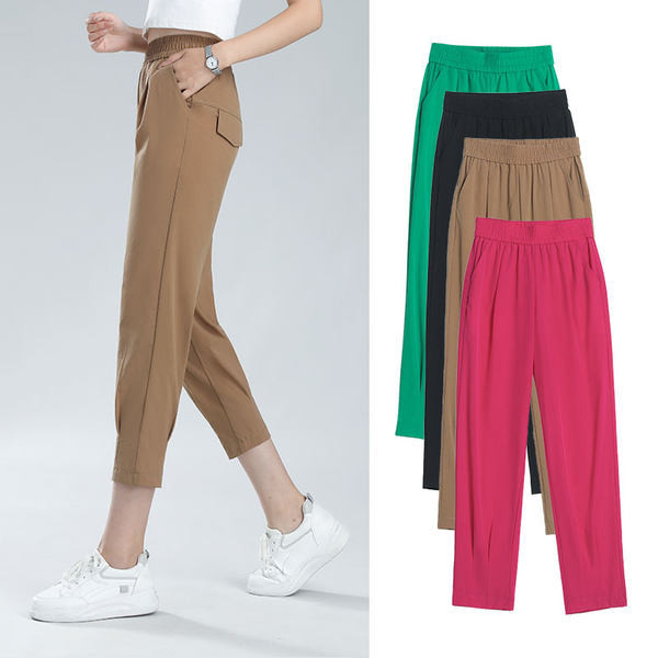 Naiste vabaaja püksid dekoratiivse taskuga