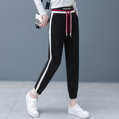 Női sportnadrág fűzős zsebbel