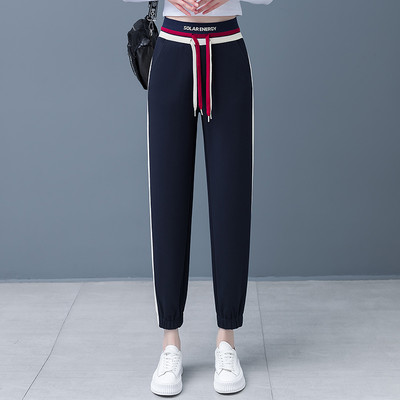 Női sportnadrág fűzős zsebbel