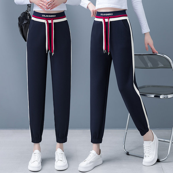 Női sportnadrág fűzős zsebbel