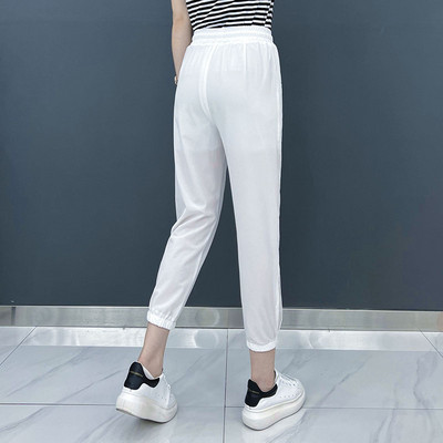 Спортни дамски панталони с джоб и връзки в два цвята