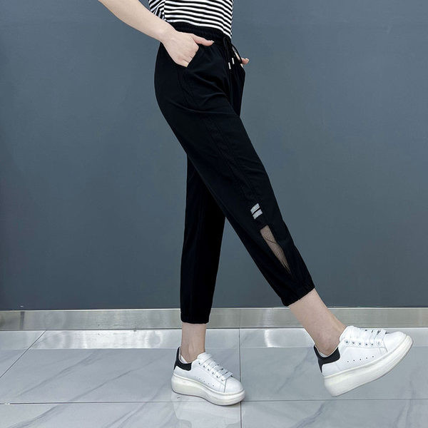 Спортни дамски панталони с джоб и връзки в два цвята 