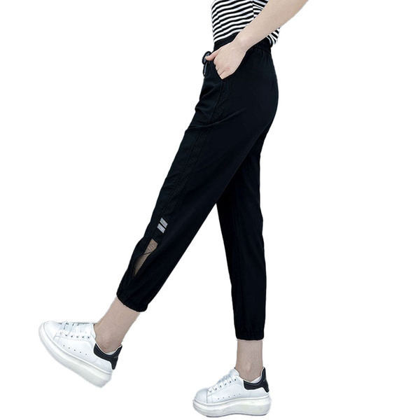 Спортни дамски панталони с джоб и връзки в два цвята 