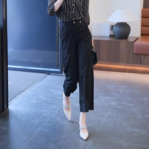 Naiste elegantsed mustad püksid