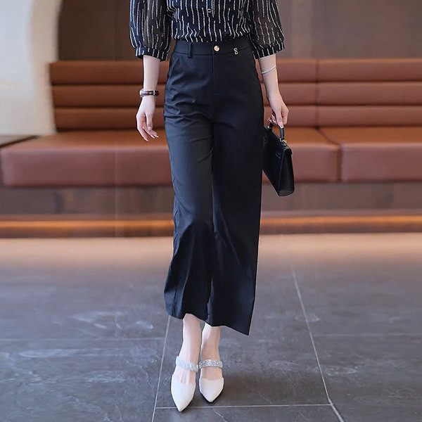 Naiste elegantsed mustad püksid