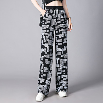 Női széles szárú nadrág gumírozott derékkal és zsebbel