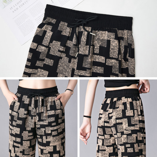 Női széles szárú nadrág gumírozott derékkal és zsebbel