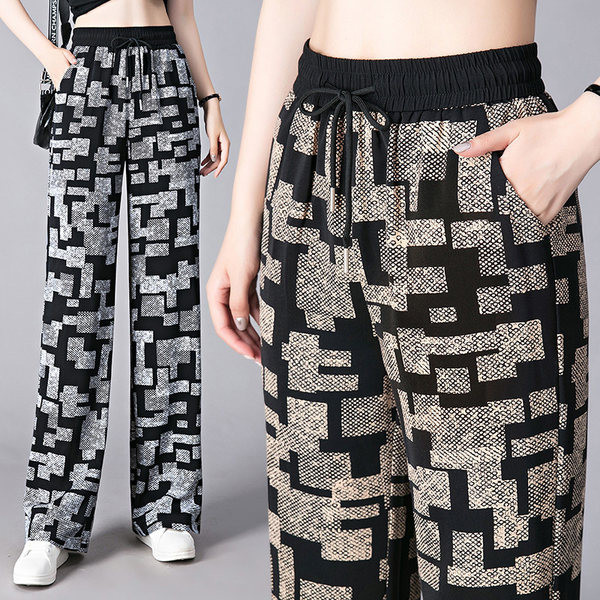 Női széles szárú nadrág gumírozott derékkal és zsebbel