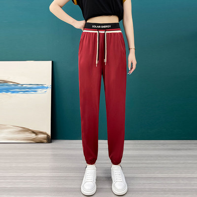 Ženske sportske hlače s gumicom i vezicama