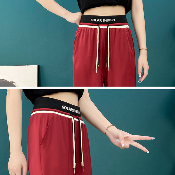 Ženske sportske hlače s gumicom i vezicama