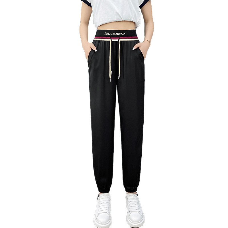 Ženske sportske hlače s gumicom i vezicama