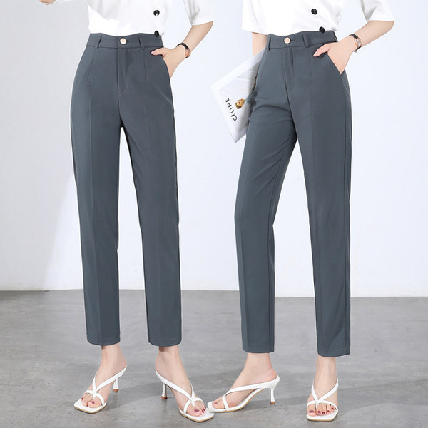 Naiste vabaajapüksid tasku ja nööbiga