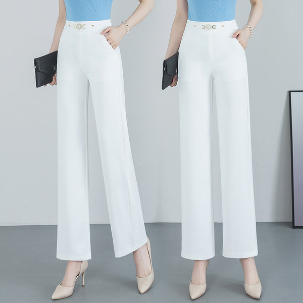 Elegáns nadrág dekoratív övvel és zsebbel