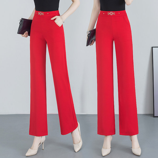 Elegáns nadrág dekoratív övvel és zsebbel