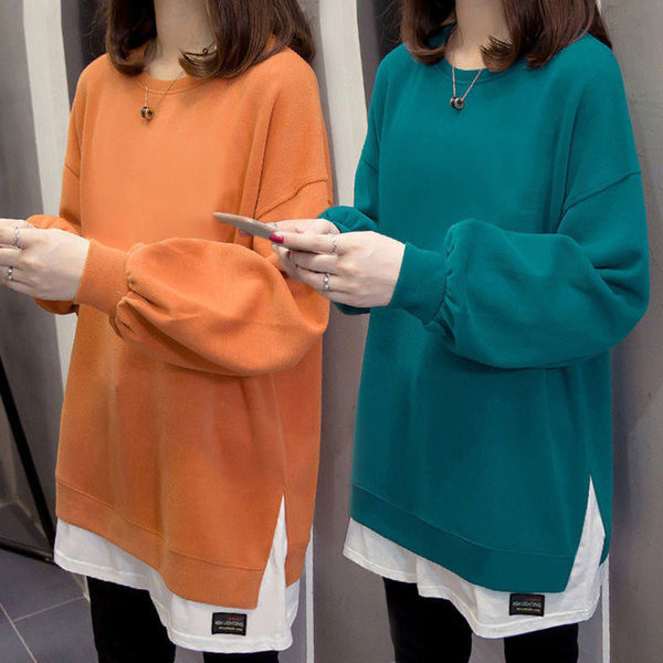 Ženska široka majica s ovalnim izrezom u više boja