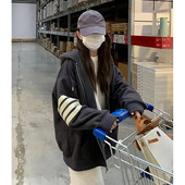 Bő fazonú női kapucnis pulóver cipzárral