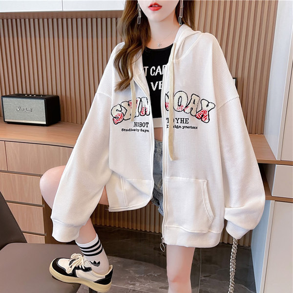 Ženska majica s printom i kopčanjem na zip