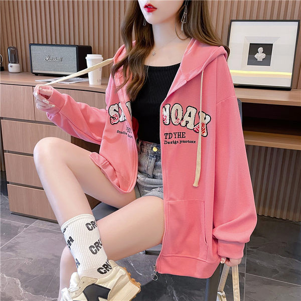 Ženska majica s printom i kopčanjem na zip