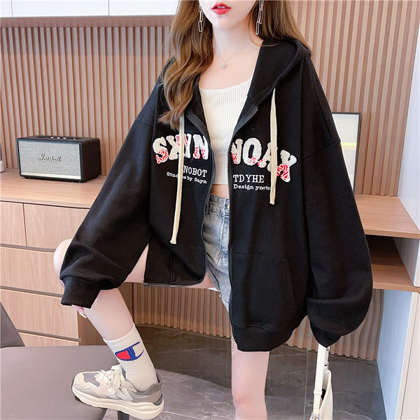 Ženska majica s printom i kopčanjem na zip