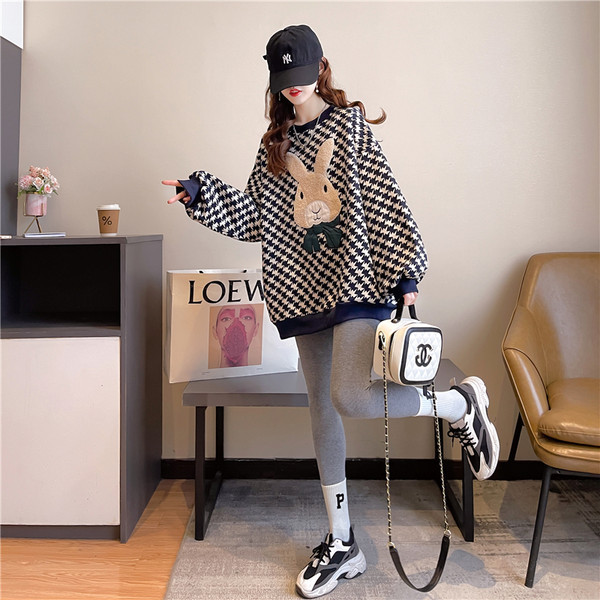 Naiste ruuduline tikandiga dressipluus - lai mudel