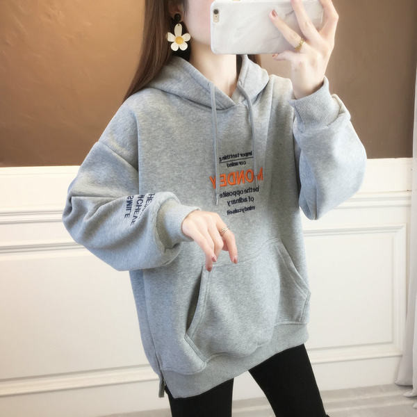 Naiste kapuutsiga dressipluus laia mustriga