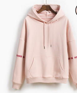 Női pulóverek új modell kapucnival