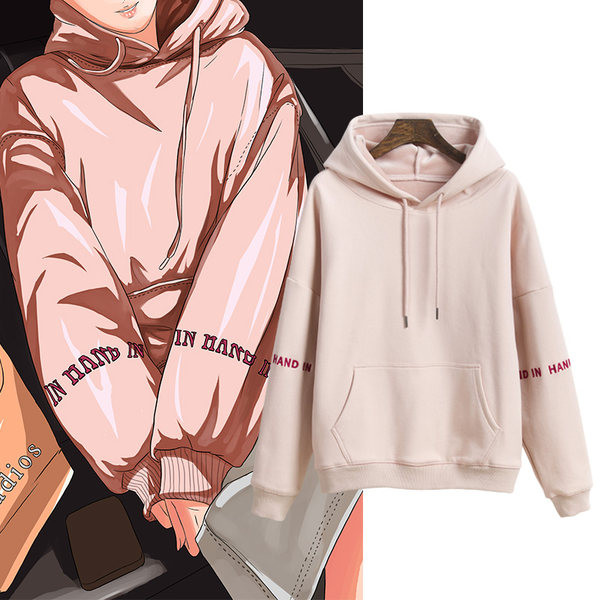 Női pulóverek új modell kapucnival