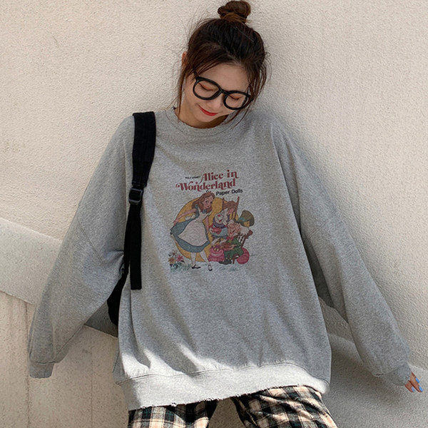 Värvilise trükise ja ovaalse kaelusega naiste dressipluus