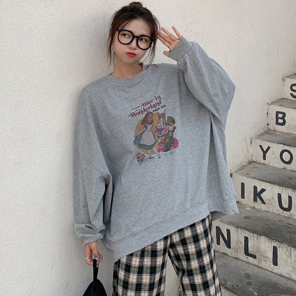 Värvilise trükise ja ovaalse kaelusega naiste dressipluus