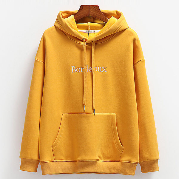 Naiste kapuutsiga dressipluusid kollast värvi - tikandiga