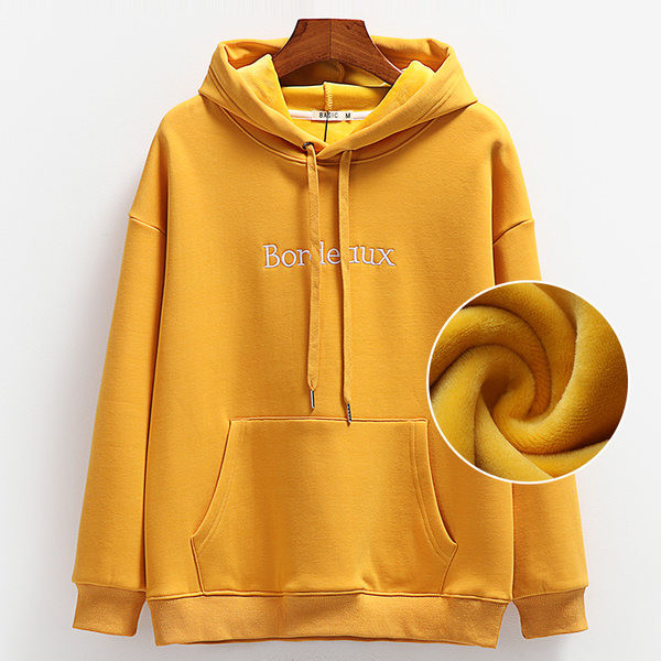 Naiste kapuutsiga dressipluusid kollast värvi - tikandiga