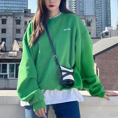 Zöld színű, hosszú ujjú női pulóver felirattal