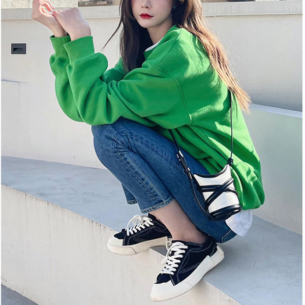 Zöld színű, hosszú ujjú női pulóver felirattal