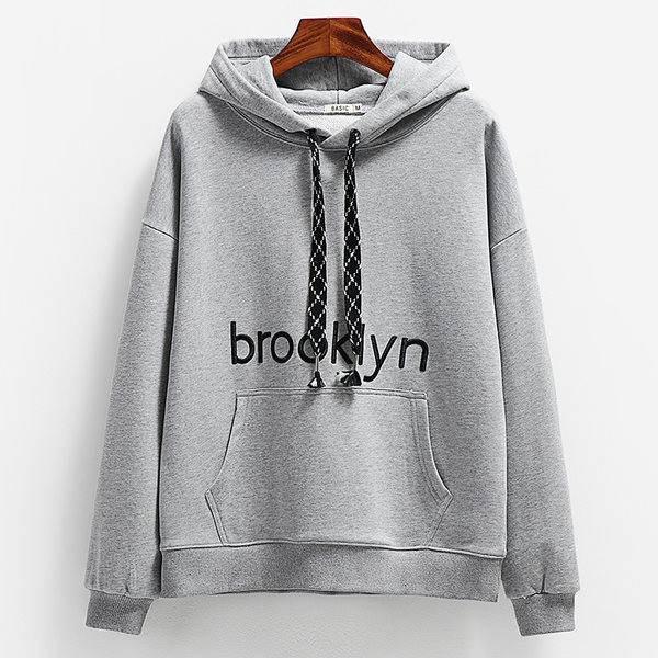 Női pulóver három színben kapucnival